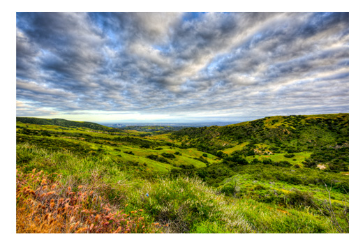 Environmental open space, green hills and blue sky